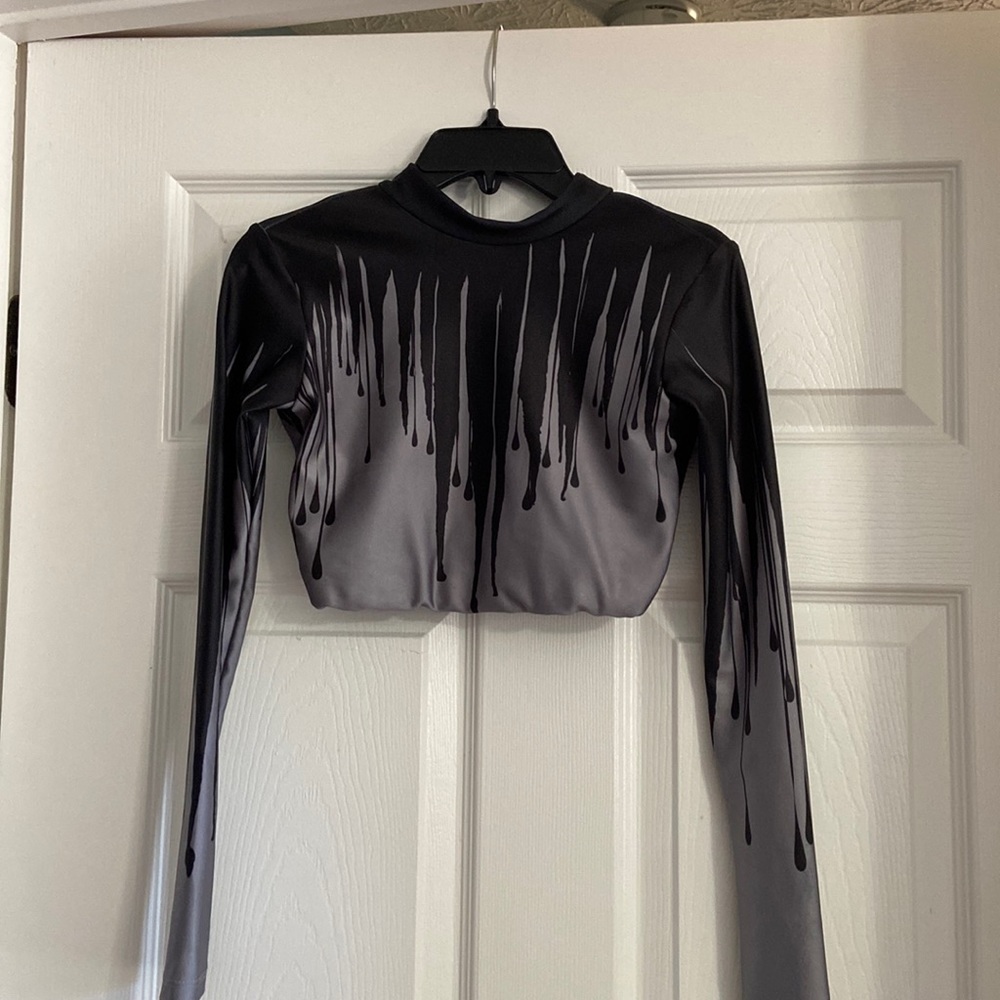 Long sleeve crop top. Really well made.